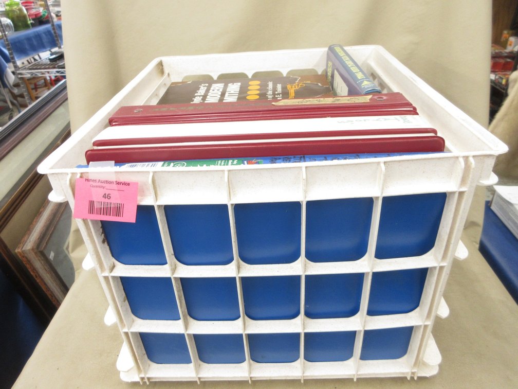 Plastic crate of firearms books