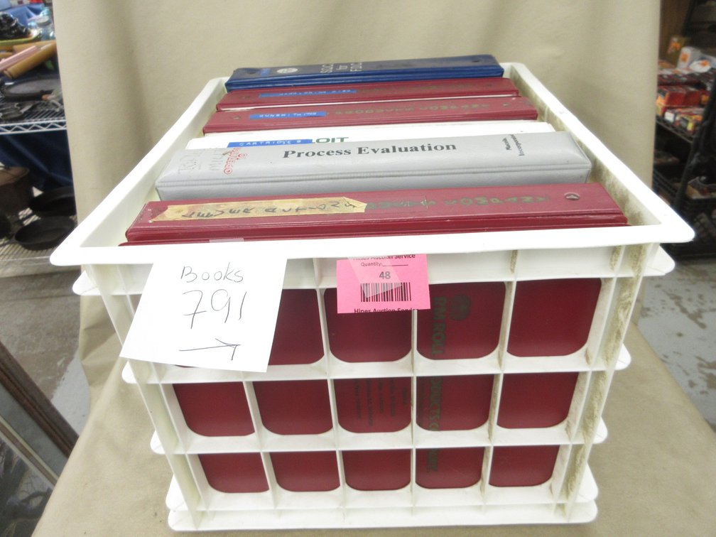 Plastic crate of firearms books
