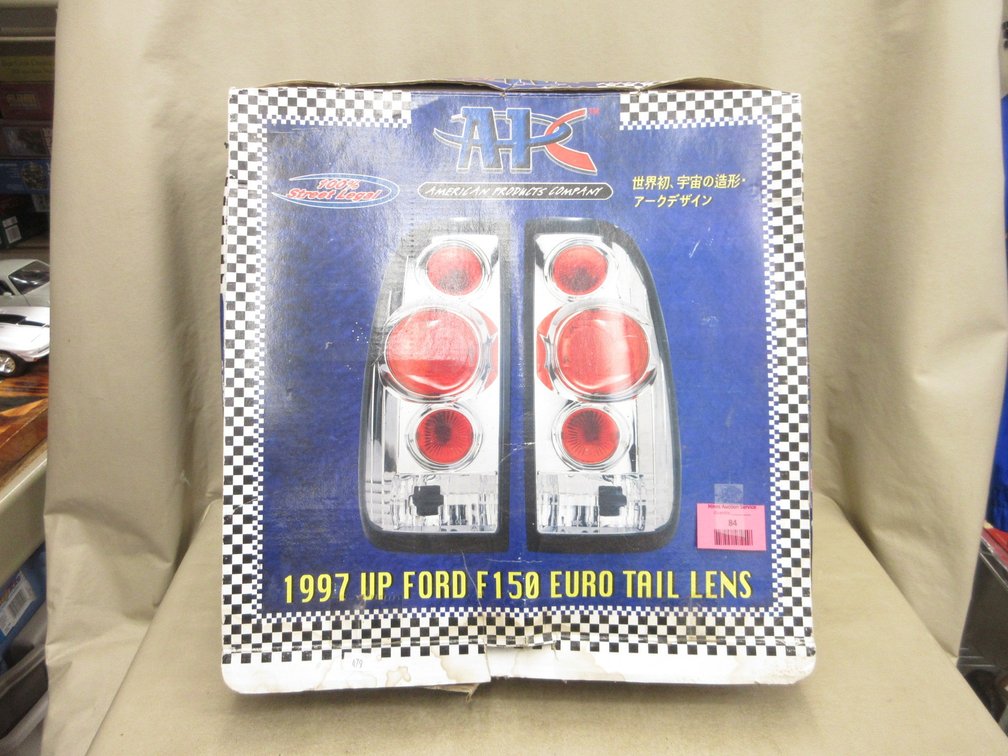 Pair of Ford pickup truck tail lights in non-matching box