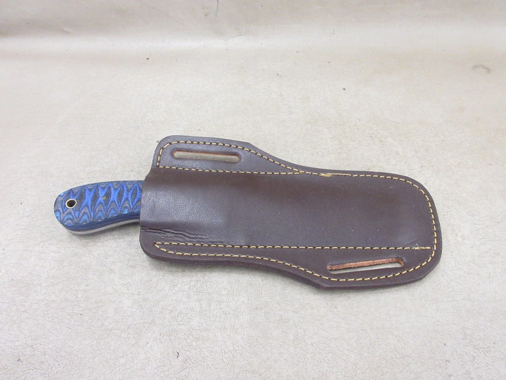 Custom-made Damascus bull cutter