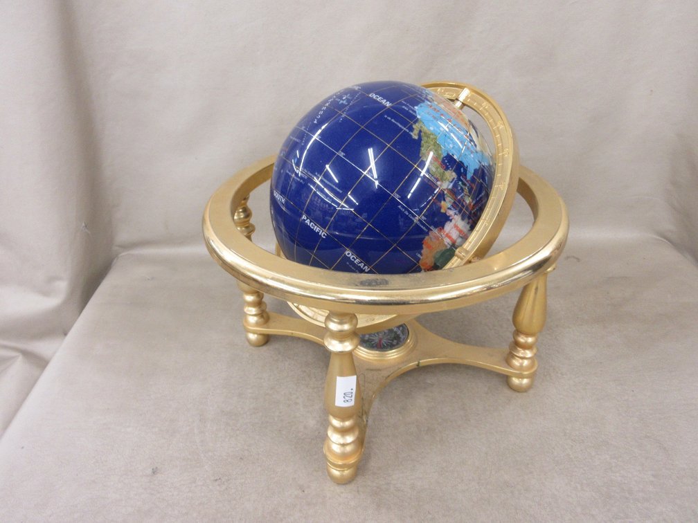 Semi-precious stone world globe on brass base