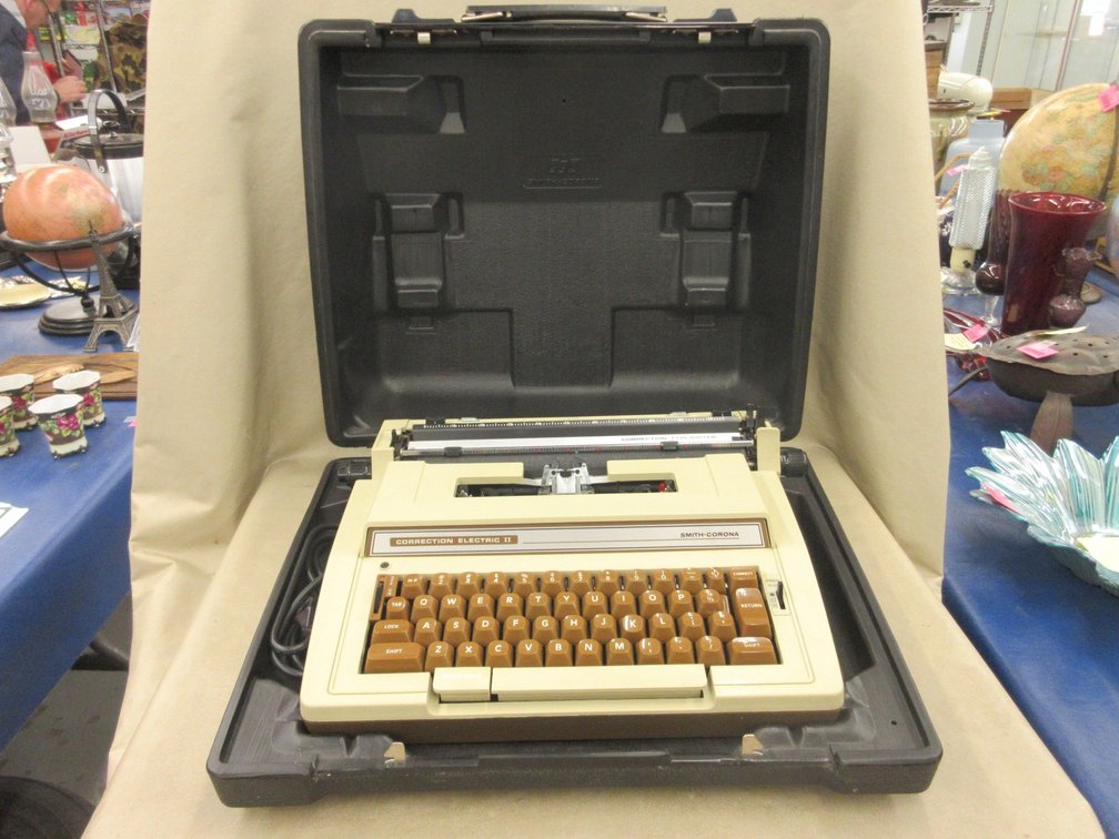 Smith Corona electric typewriter in case