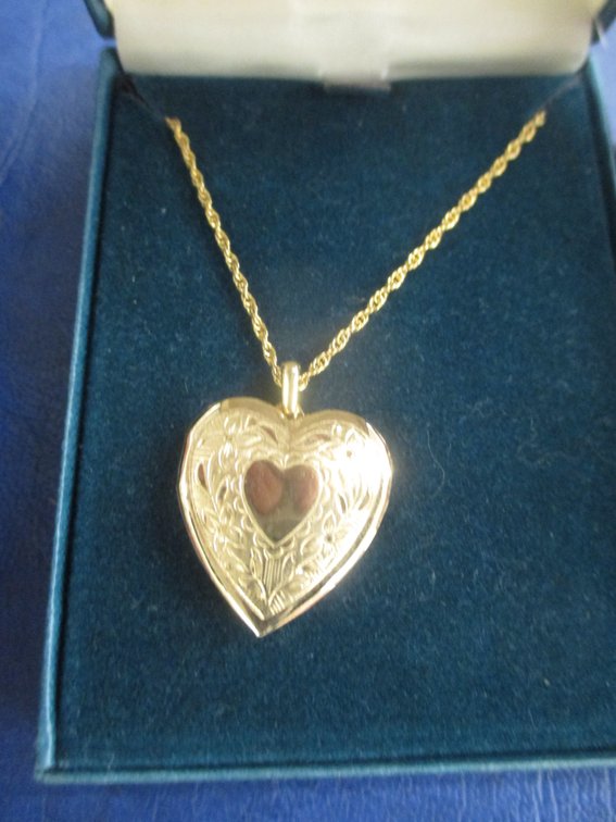 14K overlay heart locket on chin