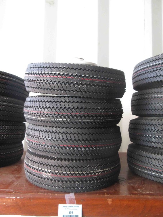 (4) New utility tires on rims