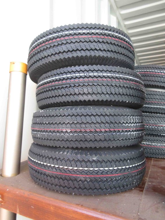 (4) New utility tires on rims