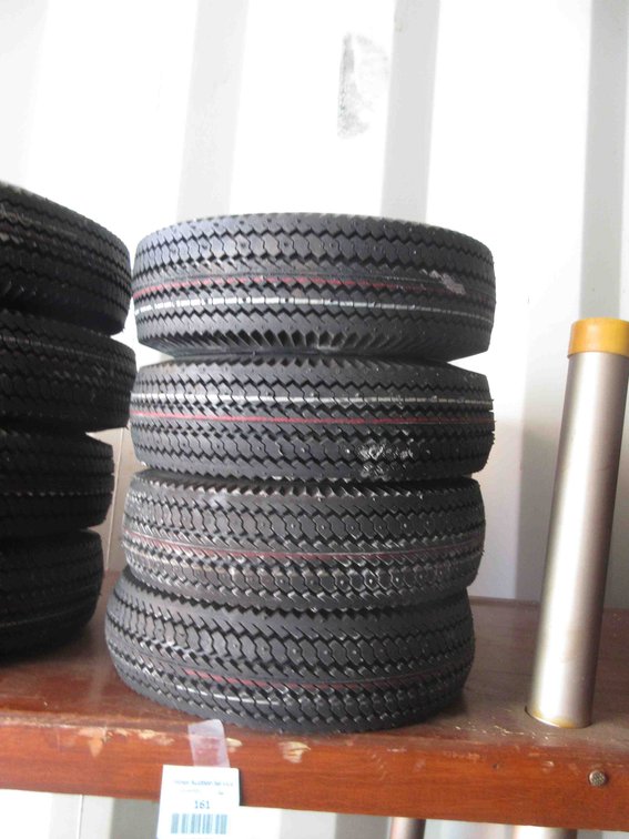 (4) New utility tires on rims