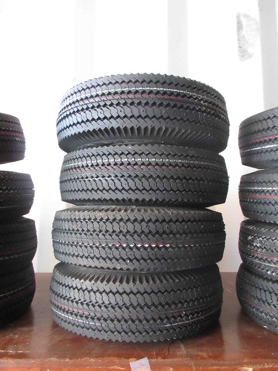 (4) New utility tires on rims