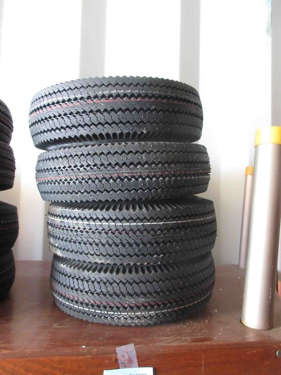 (4) New utility tires on rims