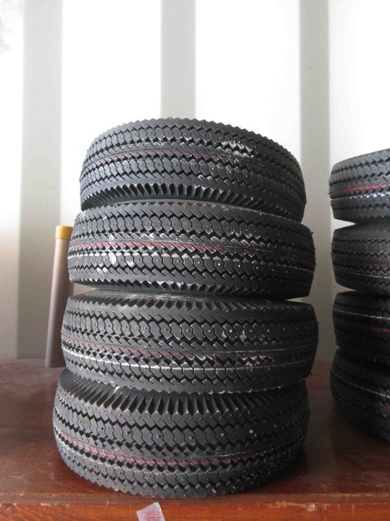 (4) New utility tires on rims