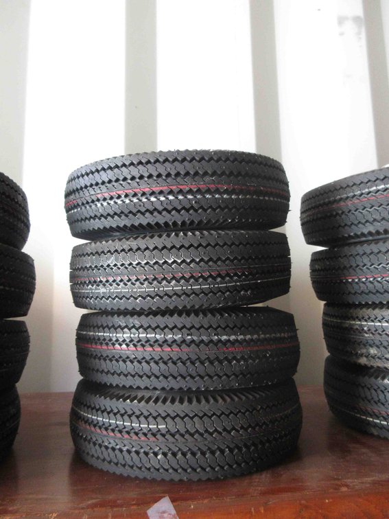 (4) New utility tires on rims