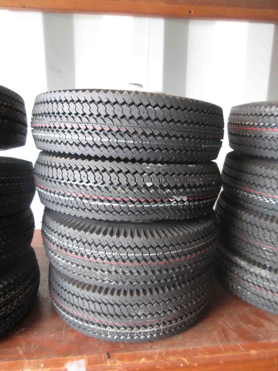 (4) New utility tires on rims