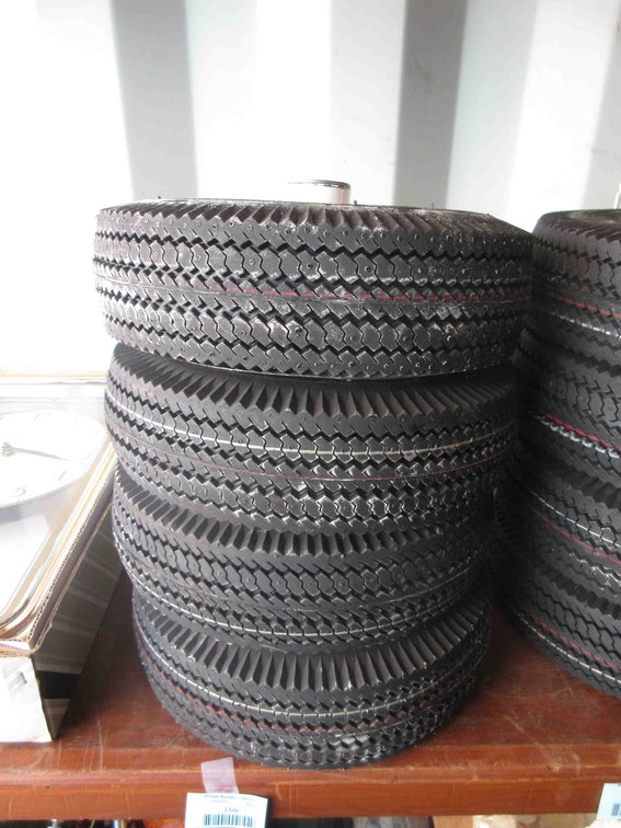 (4) New utility tires on rims