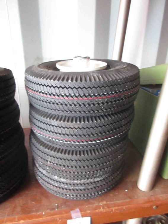 (4) New utility tires on rims