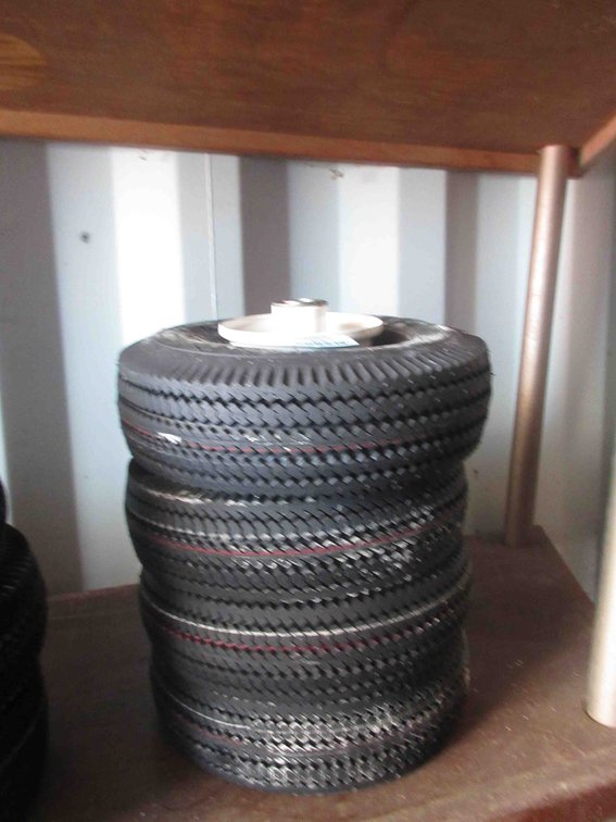 (4) New utility tires on rims