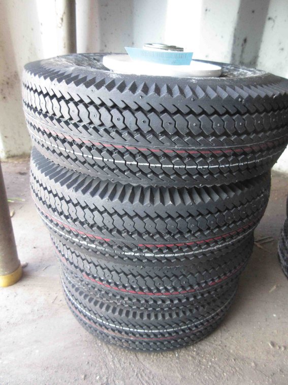 (4) New utility tires on rims