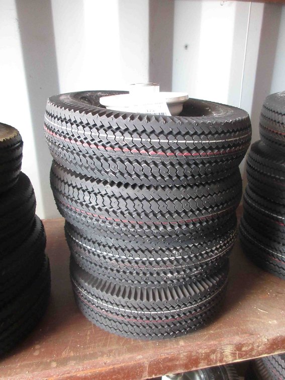(4) New utility tires on rims