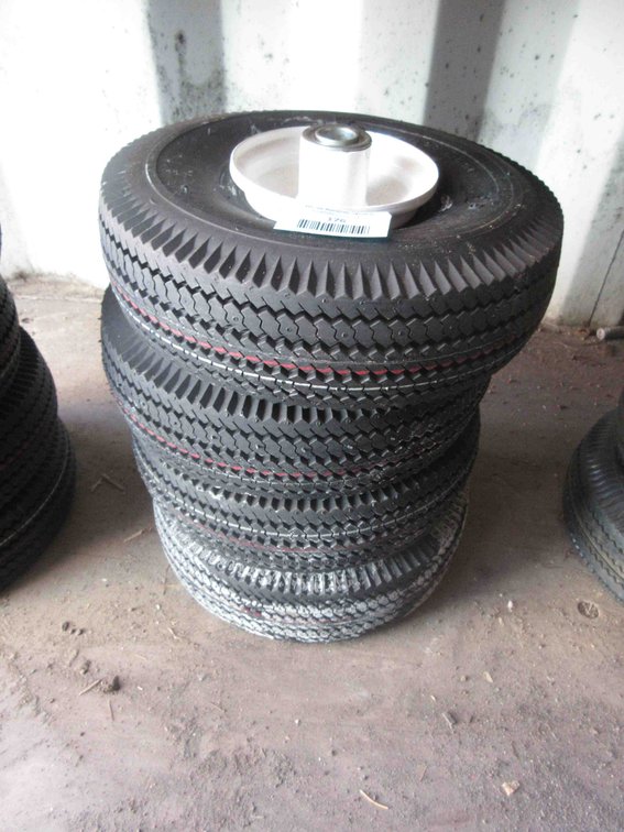 (4) New utility tires on rims
