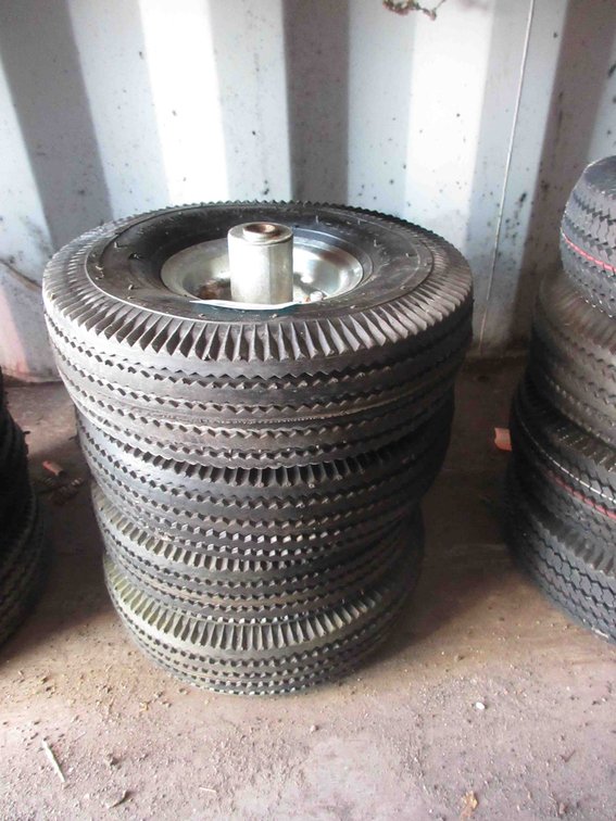 (4) New utility tires on rims