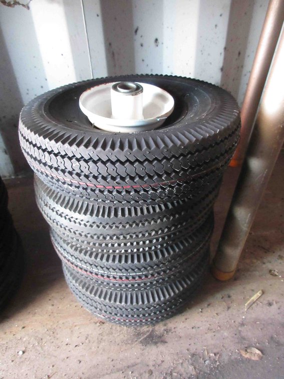 (4) New utility tires on rims