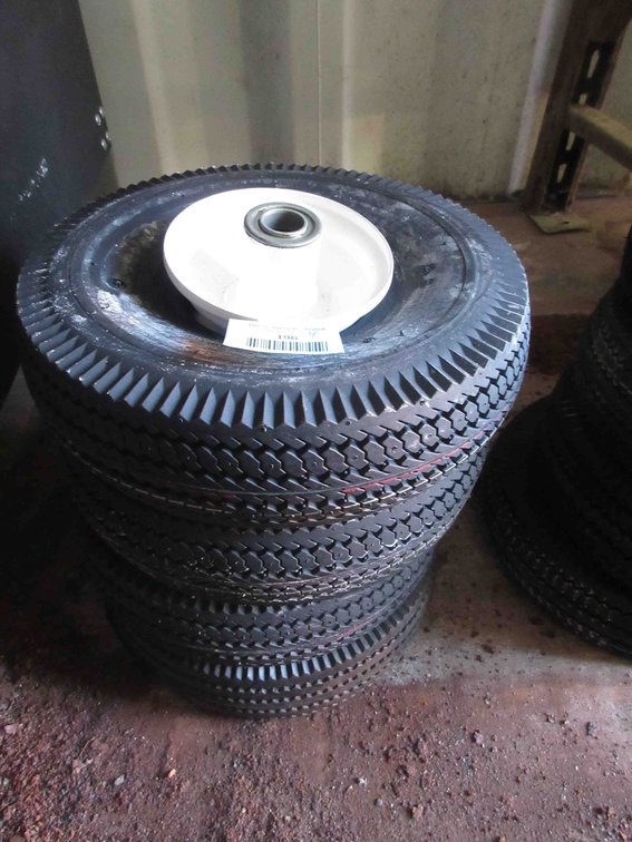 (4) New utility tires on rims