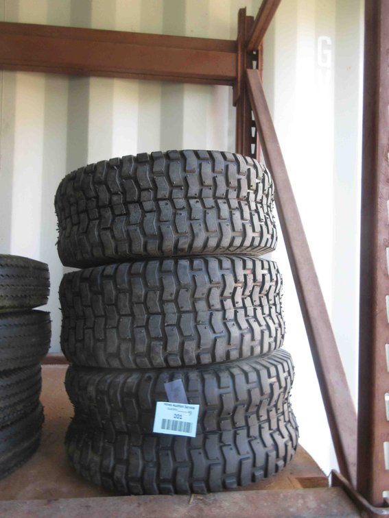 (4) New utility tires on rims