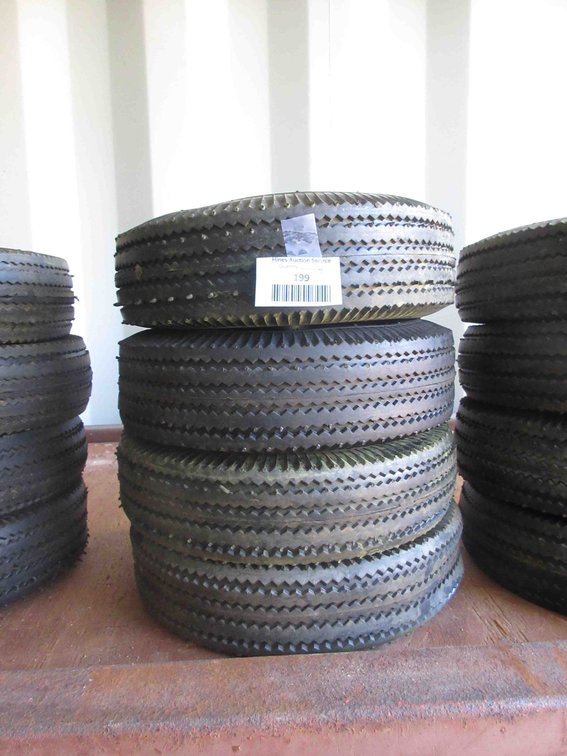 (4) New utility tires on rims