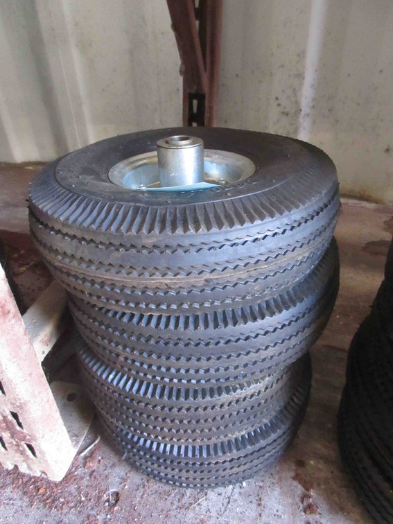 (4) New utility tires on rims