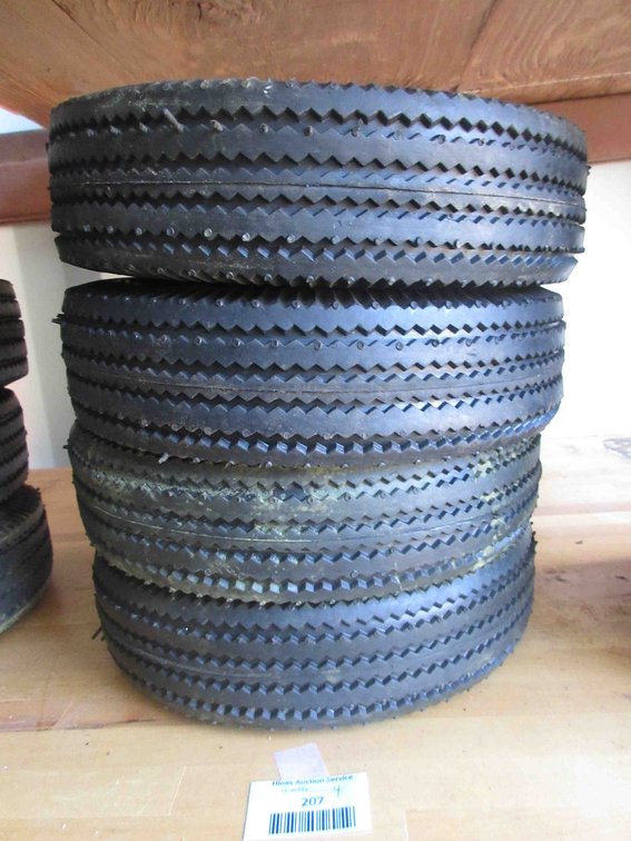 (4) New utility tires on rims