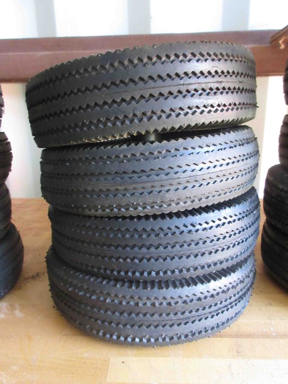 (4) New utility tires on rims