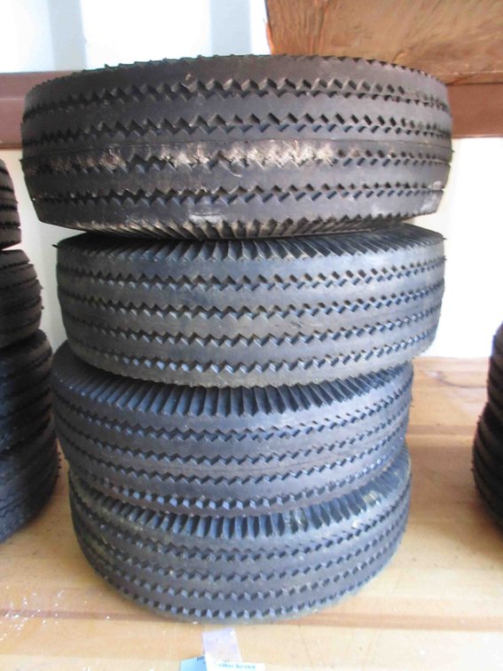 (4) New utility tires on rims