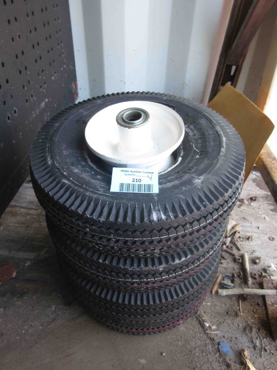 (4) New utility tires on rims