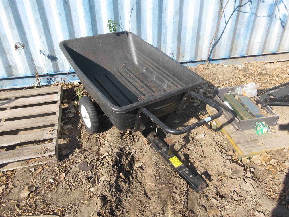 Poly dump trailer with tool holder