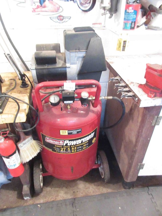 Coleman Powermate upright air compressor