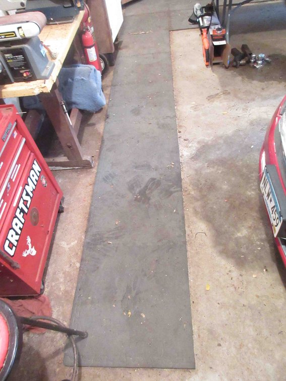 Group of foam mats on garage floor