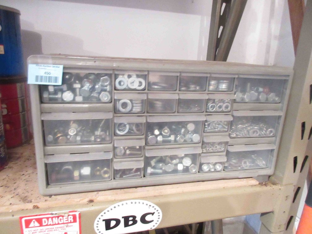 Plastic hardware bin with contents