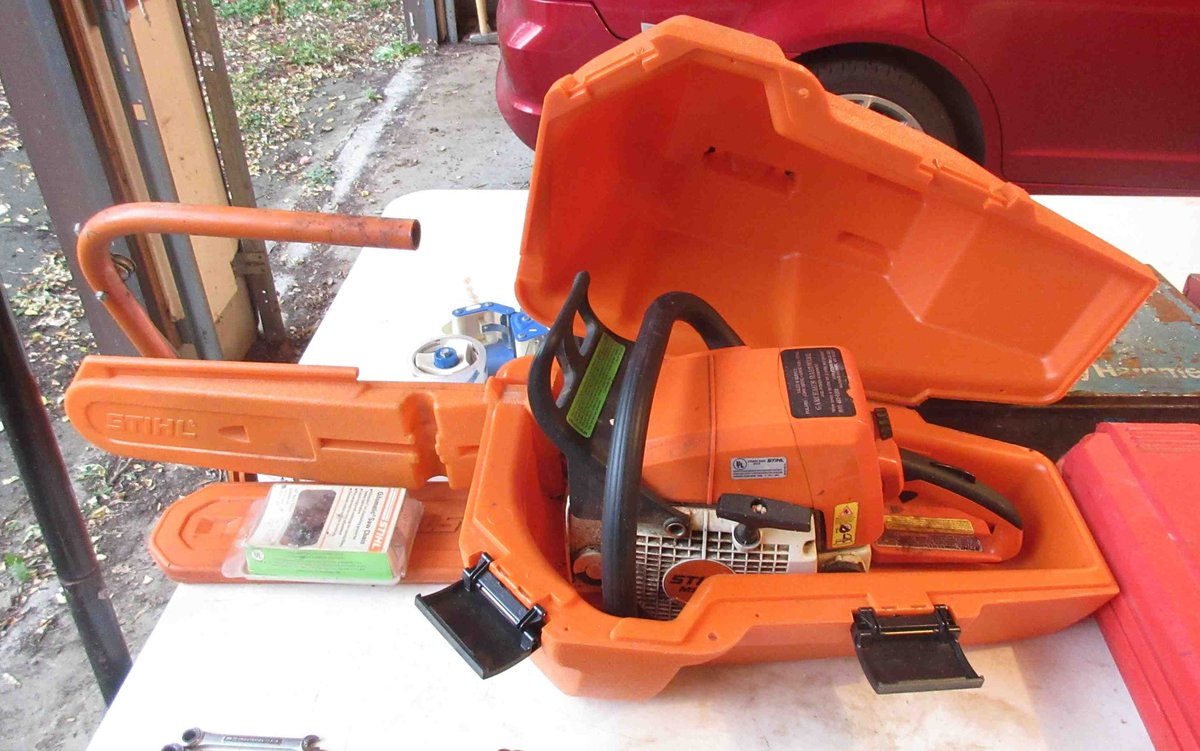 Stihl MS290 gas chainsaw in case