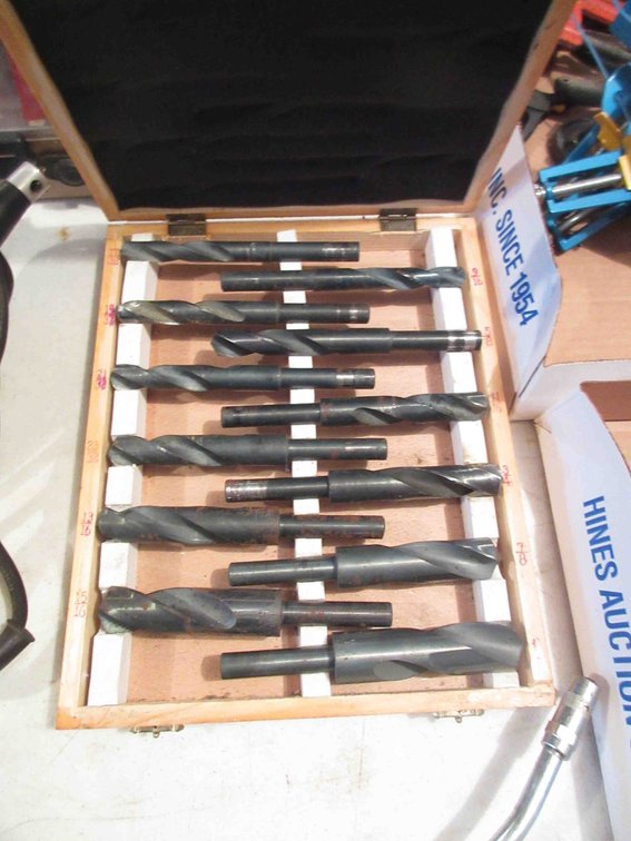 Set of drill bits in wood case