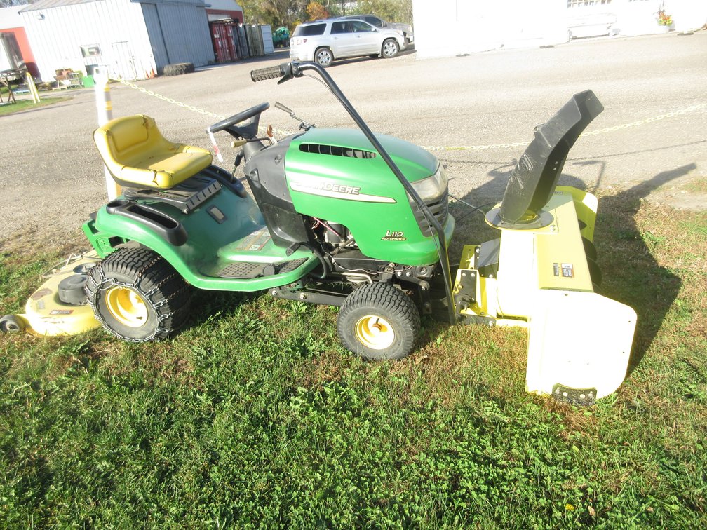 John Deere L110 riding mower with deck and front mounted 44 snowblower