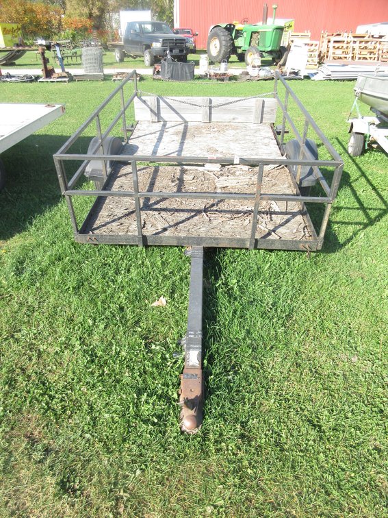 Utility trailer with pressed wood bed, need replacing