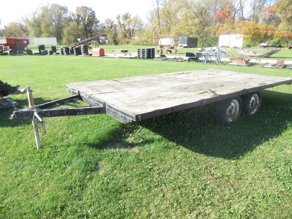 Homemade tandem axle trailer with plywood bed