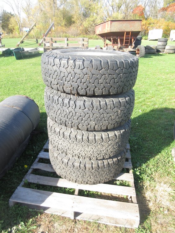 BF Goodrich All Terrain T/A tires on (8) hole rims