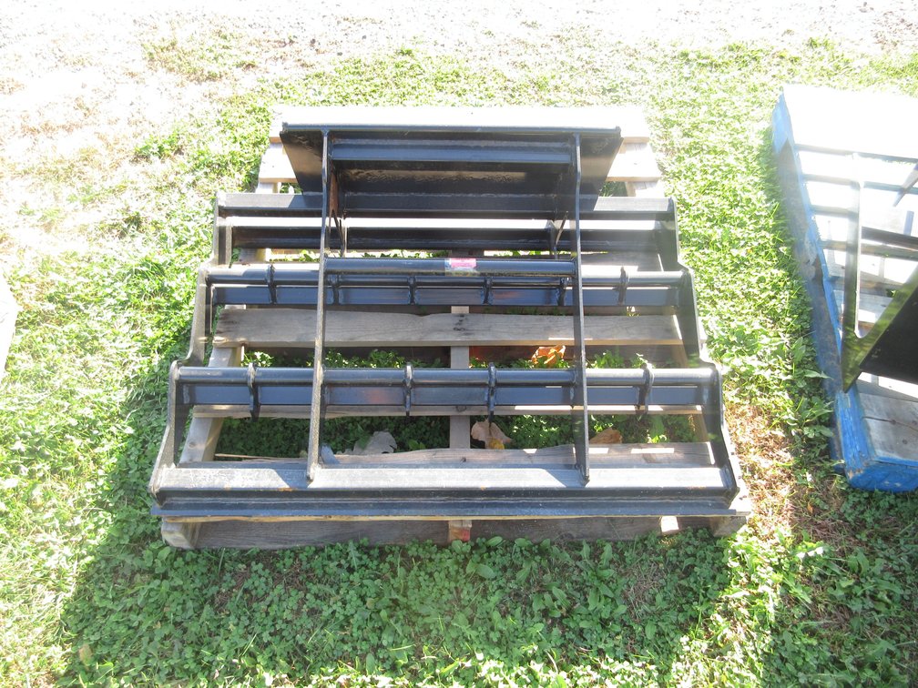 Mini skid steer grader