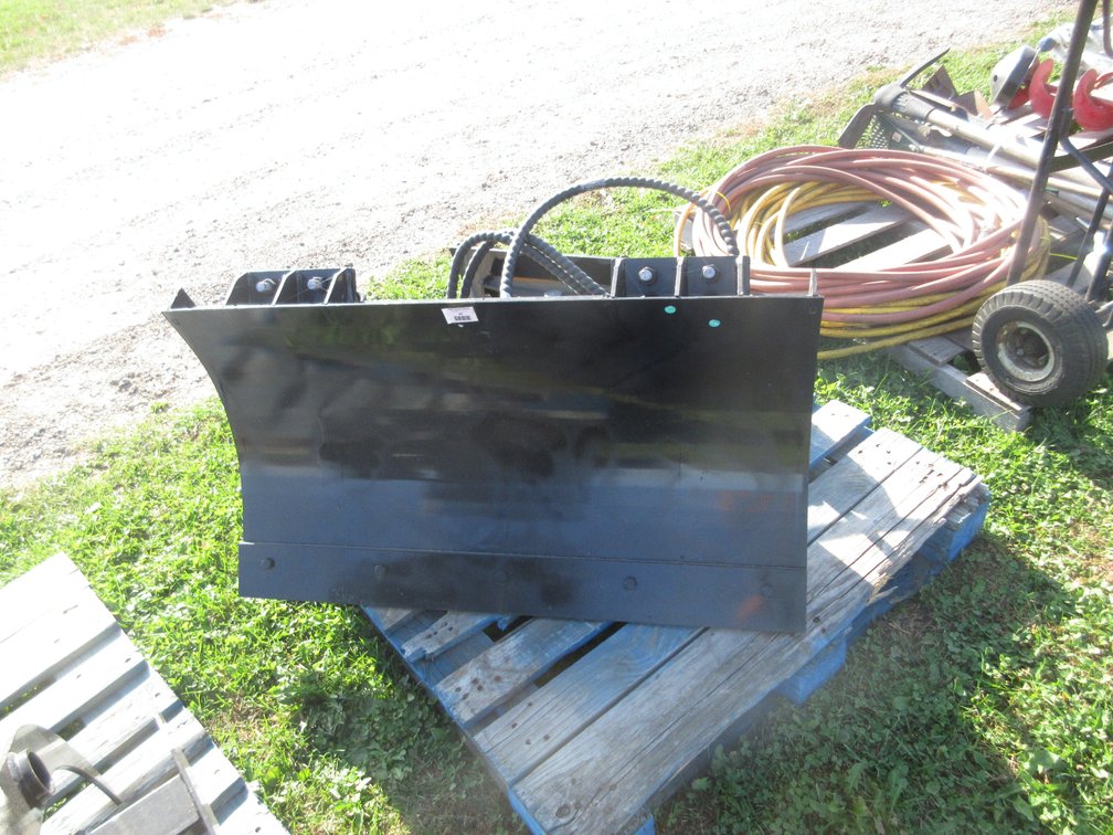 Mini skid steer tilt blade