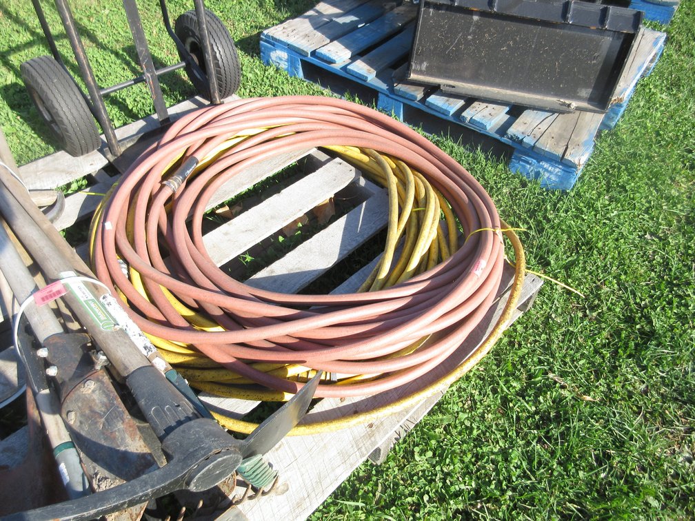 (2) Rubber garden hoses