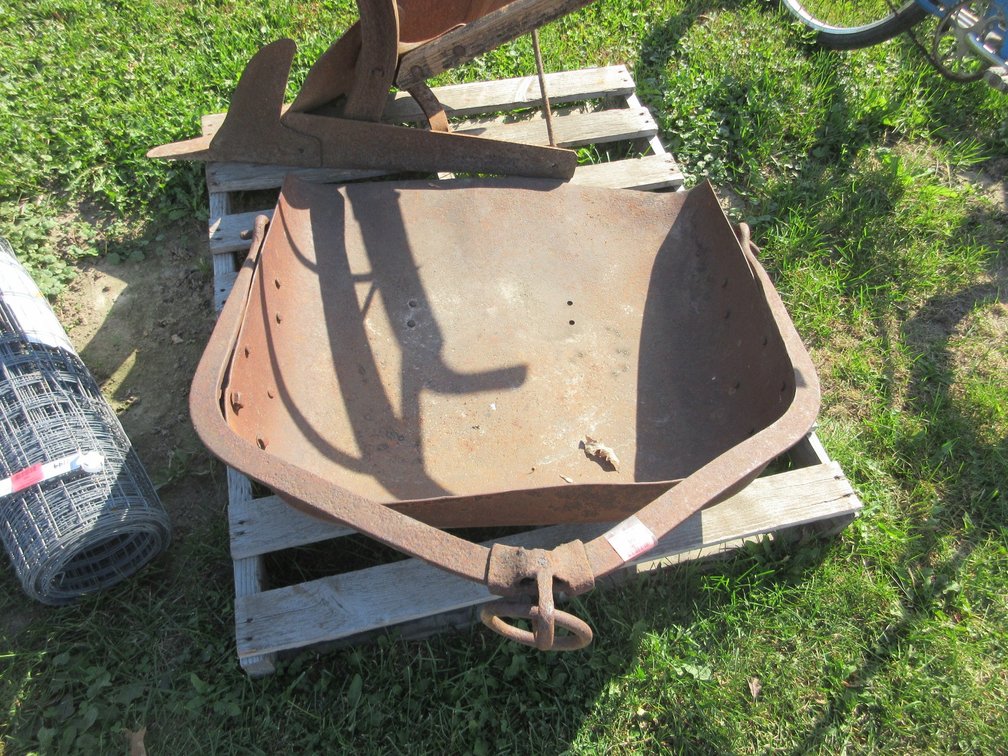 Horse drawn dirt scoop