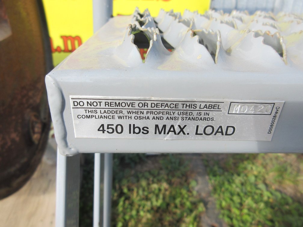 Rolling metal shop ladder