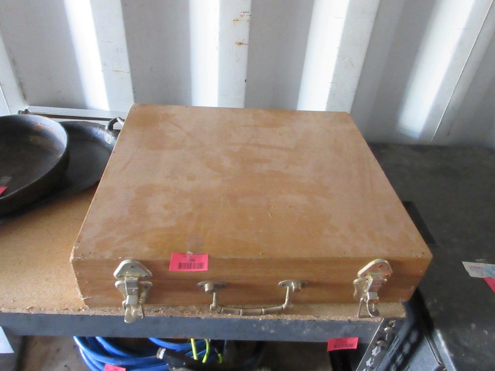 Set of gold tone flatware in wooden case
