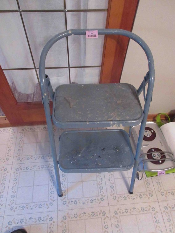 Folding metal stool