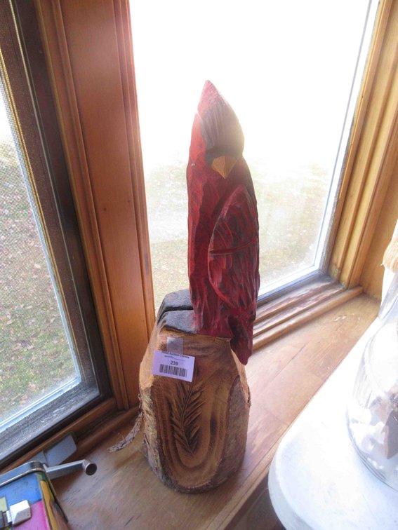 Chainsaw carved cardinal