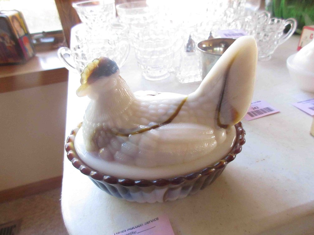 Slag glass hen on nest